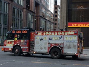 A firetruck covered in flyers