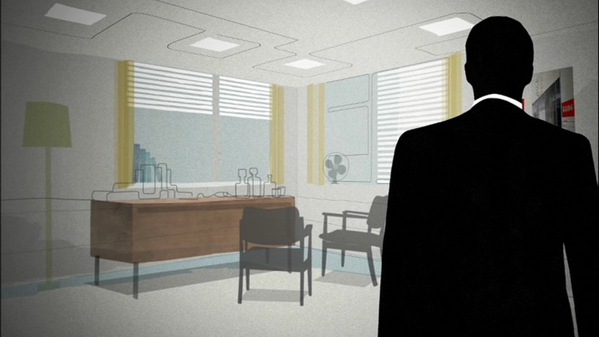 A man walking into an office