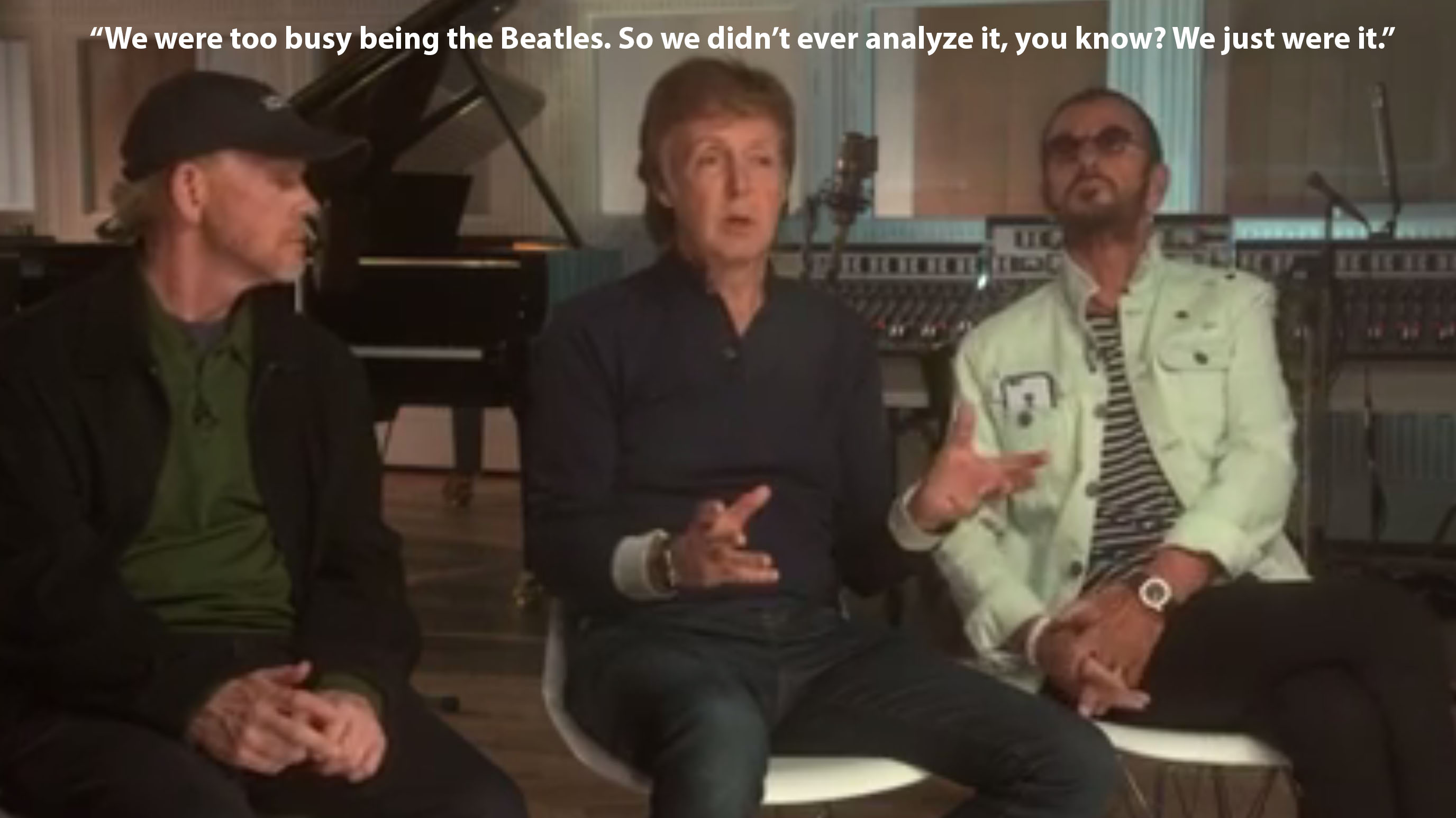 An image of Paul McCartney talking about the Beatles in an interview