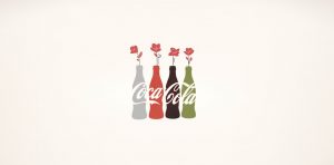An image of a Coca Cola add with flowers coming out of the bottles